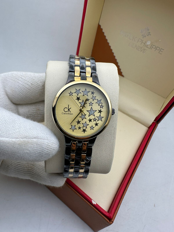 Calvin Klein Ladies  watches (Gold dial , black + gold strap)