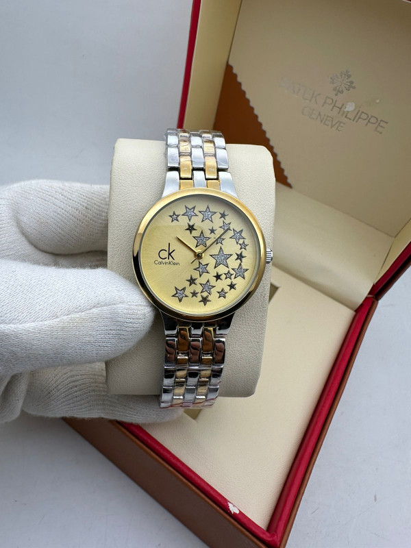 Calvin Klein Ladies  watches (Gold dial , silver + gold strap)