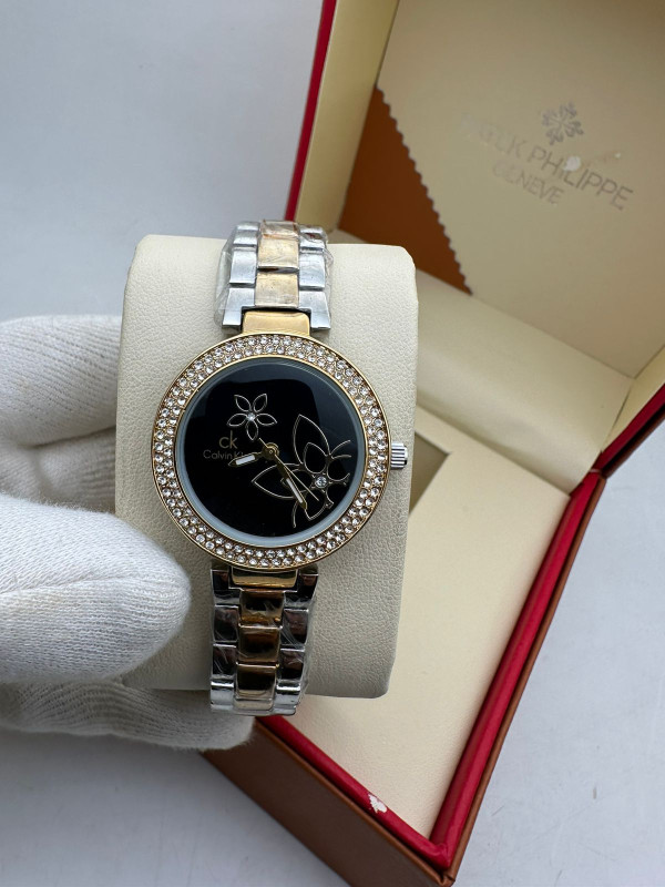 Calvin Klein Ladies  watches (Black dial , silver + gold strap)